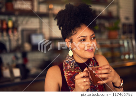 Woman, thinking and cafe with coffee cup and smile, drink and tea in restaurant for caffeine. Hands, customer and calm with cappuccino mug from barista in bistro, female person and ideas or vision Woman, thinking and cafe with coffee cup and smile, drink and tea in restaurant for caffeine. Hands, customer and calm with cappuccino mug from barista in bistro, female person and ideas or vision 117465792