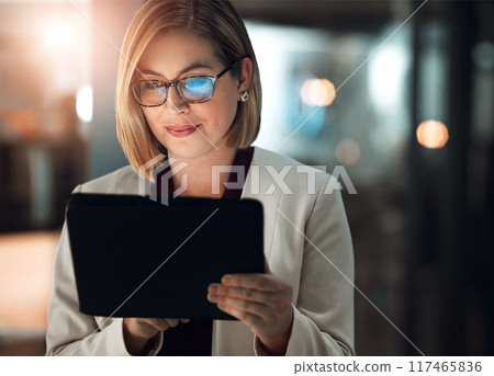 Tablet, search and business woman with glasses in night office online for planning, research or b2b client communication. Digital, feedback and manager reading social media survey or startup review 117465836