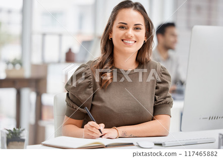 Happy, businesswoman and notebook in office for portrait with schedule, planning and agenda for goals of creative work. Female person, employee and notes with ideas for reminder of growth for project 117465882