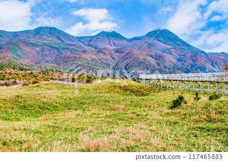 Autumn in Hokkaido: Shiretoko Five Lakes - View of the Shiretoko Mountain Range from an elevated boardwalk - 117465883