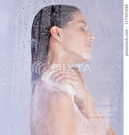 Shower, washing and hand of woman with puff in studio for hygiene, treatment or morning routine on white background. Body care, glass and model with eyes closed for grooming, water drops or wellness Shower, washing and hand of woman with puff in studio for hygiene, treatment or morning routine on white background. Body care, glass and model with eyes closed for grooming, water drops or wellness 117465898