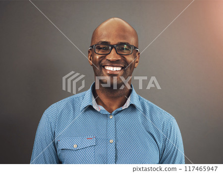 Smile, designer or portrait of black man in studio with pride, business and confidence for fashion. Startup, person or happy African entrepreneur with shirt or glasses isolated on grey background Smile, designer or portrait of black man in studio with pride, business and confidence for fashion. Startup, person or happy African entrepreneur with shirt or glasses isolated on grey background 117465947