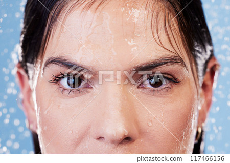 Portrait, water and woman washing hair for shampoo, cosmetics and wellness cleaning or conditioner. Female person, beauty and rinsing scalp in studio blue background for skin care or morning routine Portrait, water and woman washing hair for shampoo, cosmetics and wellness cleaning or conditioner. Female person, beauty and rinsing scalp in studio blue background for skin care or morning routine 117466156