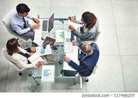 Meeting, statistics and business people in office with laptop for planning, strategy and collaboration. Charts, graphs and teamwork in meeting for growth, development and data analysis from above Meeting, statistics and business people in office with laptop for planning, strategy and collaboration. Charts, graphs and teamwork in meeting for growth, development and data analysis from above 117466207
