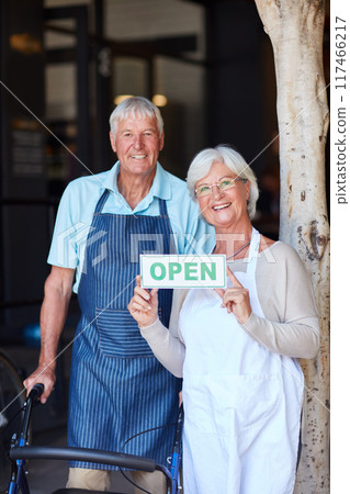 Senior couple, small business and open sign portrait of person with disability at coffee shop opening. Working, management and proud elderly people with entrepreneur and cafe owner at restaurant 117466217