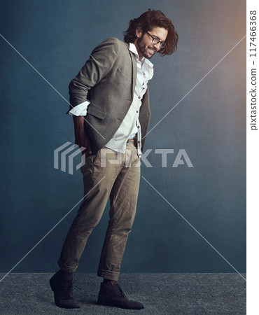 Charming, businessman and hands in pocket with messy suit for fashion trend isolated in studio. Smile, male person and creative professional with pride and ambition in job with mockup and lens flare Charming, businessman and hands in pocket with messy suit for fashion trend isolated in studio. Smile, male person and creative professional with pride and ambition in job with mockup and lens flare 117466368