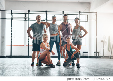 Fitness class, smile and portrait of people in gym for health, wellness and body workout challenge. Happy, friends and group of athletes with personal trainer for exercise together in sports center. 117466976