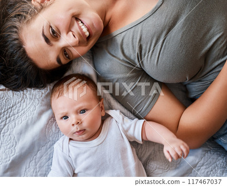 Portrait, mother and baby in bed at home for relax, rest and bonding together as family. Happy people, mom and boy infant in bedroom for embrace with love, support or security as parent in apartment Portrait, mother and baby in bed at home for relax, rest and bonding together as family. Happy people, mom and boy infant in bedroom for embrace with love, support or security as parent in apartment 117467037