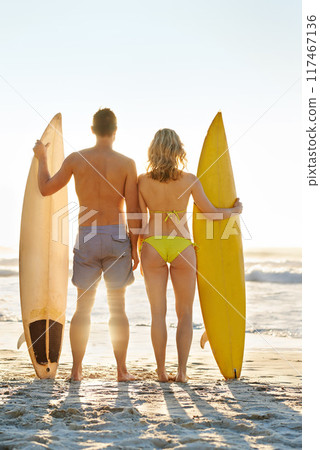 Surfers, back or couple at ocean to relax for adventure, anniversary or wellness in Miami, Florida. Travel, surfboard or people waiting for surfing on holiday vacation trip at beach or sea in summer 117467136