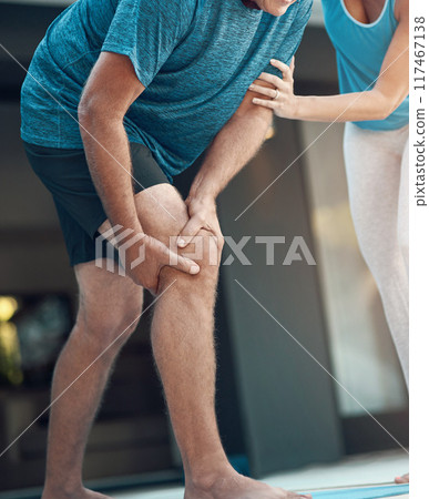 Man, knee and pain from injury at house for fitness exercise, massage joint problem or osteoporosis of medical help. People, leg and anatomy risk from yoga training for rehabilitation, care or ache 117467138
