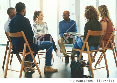 Meeting, people and collaboration sitting in office for teamwork, communication and diversity. Group, men and woman in circle discussion for company planning, brainstorming and working together 117467153