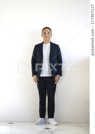 A man in his 60s looking at the camera, full body A man in his 60s looking at the camera, full body 117467227