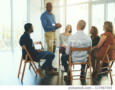 Meeting, people and collaboration speaking in office for teamwork, communication and diversity. Group, men and woman in boardroom discussion for company planning, brainstorming and working together Meeting, people and collaboration speaking in office for teamwork, communication and diversity. Group, men and woman in boardroom discussion for company planning, brainstorming and working together 117467303