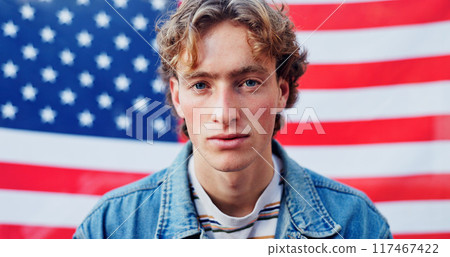 Man, portrait and american flag for patriotic pride and heritage in background. Male model, stars and stripes for traditional in USA, freedom or representation in celebration for human rights 117467422