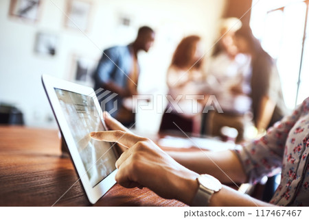 Creative, hand and tablet with design person at table in boardroom of office for project management. App, business and technology with employee in workplace for administration or planning closeup 117467467
