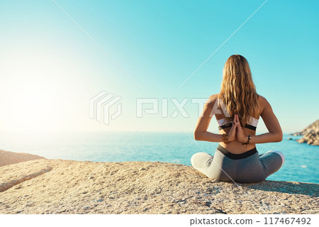 Outdoor, prayer hands and back of woman for yoga, wellness and spiritual peace in California. Beach, female yogi and namaste with meditation for wellbeing, relaxing and mental health by mockup space 117467492