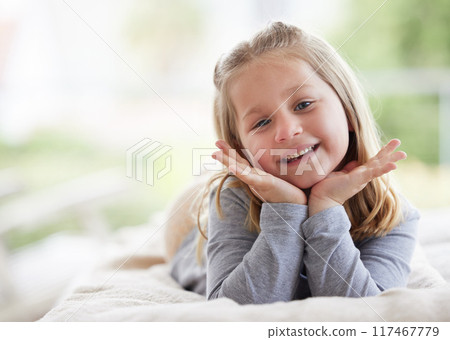 Portrait, childhood and young girl in bedroom for relax, holiday and smile for weekend in home. Kid, happy and vacation in countryside for development, fun and hands in house for resting and dreaming Portrait, childhood and young girl in bedroom for relax, holiday and smile for weekend in home. Kid, happy and vacation in countryside for development, fun and hands in house for resting and dreaming 117467779