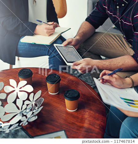 Hands, team and business people planning with data, statistics and tablet info in startup idea. Group, collaboration or financial analyst brainstorming analysis of graph or writing notes on paper 117467814