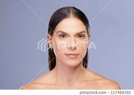 Woman, portrait and skincare in studio for pamper, facial treatment and cosmetics on blue background. Female person, healthy skin and beauty for dermatology, grooming and confident for mockup space Woman, portrait and skincare in studio for pamper, facial treatment and cosmetics on blue background. Female person, healthy skin and beauty for dermatology, grooming and confident for mockup space 117468192