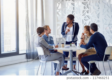 Planning, meeting and businesspeople with black woman leader, discussion or teamwork in office. Collaboration, lawyer team or diversity for litigation, strategy or brainstorming for law firm employee 117468251
