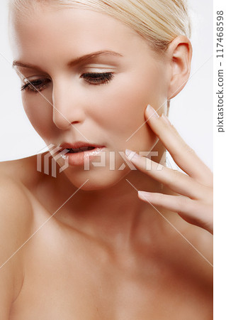 Thinking, studio and woman with natural makeup for skincare, cosmetics and beauty on white background. Thoughtful, dermatology and female person for self care with aesthetic, skin treatment and glow Thinking, studio and woman with natural makeup for skincare, cosmetics and beauty on white background. Thoughtful, dermatology and female person for self care with aesthetic, skin treatment and glow 117468598