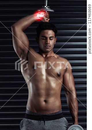 Athlete, man and inflammation in wrist for exercise, fitness and weight lifting for health, muscle or training. Shirtless, male person and body building with joint pain, x ray and overlay in workout Athlete, man and inflammation in wrist for exercise, fitness and weight lifting for health, muscle or training. Shirtless, male person and body building with joint pain, x ray and overlay in workout 117468669