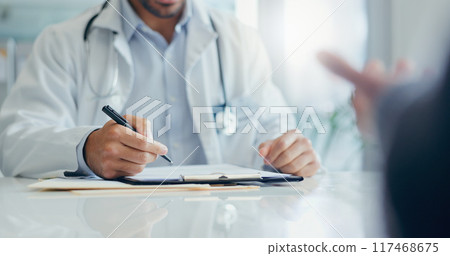 Hands, doctor and documents with consultation, healthcare and conversation for wellness, insurance and appointment. Closeup, people and medical with checkup, paperwork and discussion for results Hands, doctor and documents with consultation, healthcare and conversation for wellness, insurance and appointment. Closeup, people and medical with checkup, paperwork and discussion for results 117468675