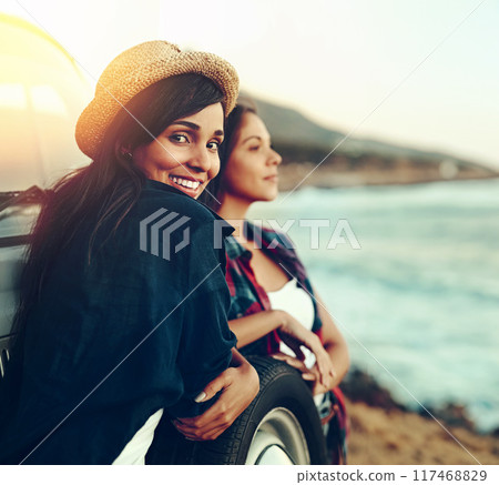 Car, portrait and women at a beach for road trip pause, break and bonding at sunset on vacation in nature. Sunrise, travel or girl friends at ocean for summer, holiday or adventure, journey or trip Car, portrait and women at a beach for road trip pause, break and bonding at sunset on vacation in nature. Sunrise, travel or girl friends at ocean for summer, holiday or adventure, journey or trip 117468829