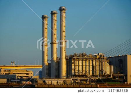 Chimney in an industrial area 117468886