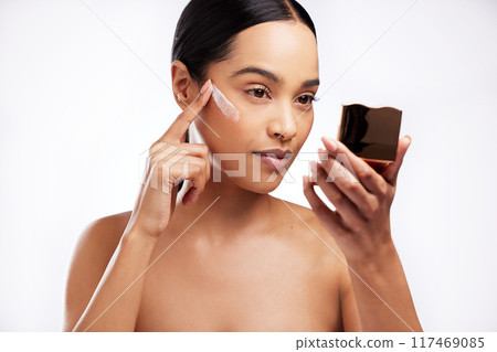 Mirror, model girl and beauty or face for cream and product in studio with hydration for wellness. Sunscreen, woman and application in morning for summer isolated by white background with self care Mirror, model girl and beauty or face for cream and product in studio with hydration for wellness. Sunscreen, woman and application in morning for summer isolated by white background with self care 117469085
