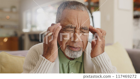 Home, senior man and headache on sofa for stress, emotional conflict and temporal vertigo. Living room, couch and old person with pain, migraine and anxiety due overthinking in retirement in house 117469272