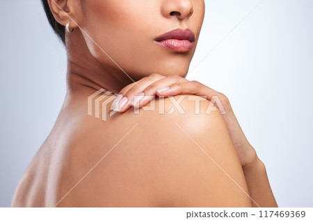 Woman, shoulder and soft skincare in studio, healthy and hands for beauty on white background. Female person, cosmetics and touch smooth skin, facial treatment and pamper routine for dermatology 117469369