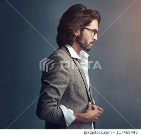 Man, studio and fashion with cool for stylish or handsome isolated on black background. Trendy, clothes and junior business reporter in company for breaking news interview in America for elections. 117469448