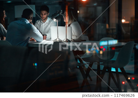 Group, brainstorming and night in meeting, laptop and planning of teamwork, deadline and project for website. Business, computer and admin assistant, online and people in boardroom, dark and startup Group, brainstorming and night in meeting, laptop and planning of teamwork, deadline and project for website. Business, computer and admin assistant, online and people in boardroom, dark and startup 117469626