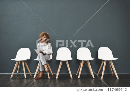 Waiting room, document and woman for job interview, hiring and recruitment in office. Chairs, job seeker and female person as candidate of human resources, patience and preparation with paperwork Waiting room, document and woman for job interview, hiring and recruitment in office. Chairs, job seeker and female person as candidate of human resources, patience and preparation with paperwork 117469642