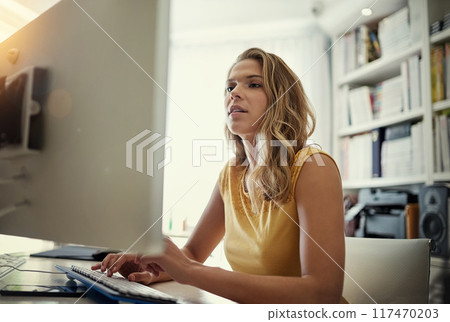 Woman, typing and thinking with pc in home office for remote work with ideas in planning, review and editing. Person, writer and computer for proofreading, click and keyboard for story development 117470203