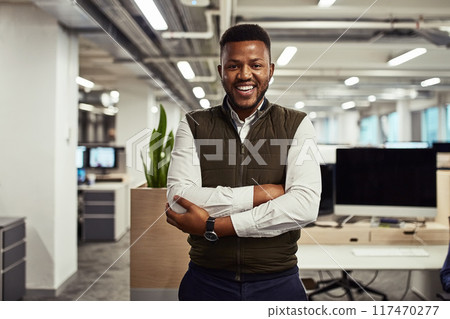 Portrait, intern and black man in office with arms crossed, smile and confidence. Startup, company and new job opportunity for growth with positivity and consulting agency employee with happiness. 117470277