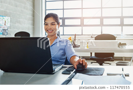 Happy, business woman and laptop with accountant at desk for career in finance, research or development at office. Young female person or financial advisor with smile on computer for job at workplace Happy, business woman and laptop with accountant at desk for career in finance, research or development at office. Young female person or financial advisor with smile on computer for job at workplace 117470555