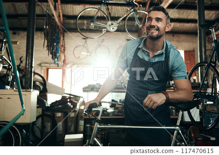 Man, bicycle shop and thinking for maintenance work, startup with transport service. Bike, mechanic and Male entrepreneur in workshop with idea, thoughtful for sustainable business with happiness Man, bicycle shop and thinking for maintenance work, startup with transport service. Bike, mechanic and Male entrepreneur in workshop with idea, thoughtful for sustainable business with happiness 117470615