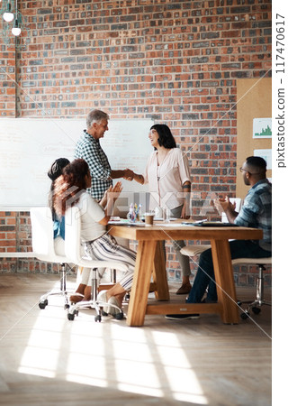 Team, handshake and meeting with deal of creative staff with success and partnership planning. Management, people and support with project achievement and applause from agreement and b2b Team, handshake and meeting with deal of creative staff with success and partnership planning. Management, people and support with project achievement and applause from agreement and b2b 117470617