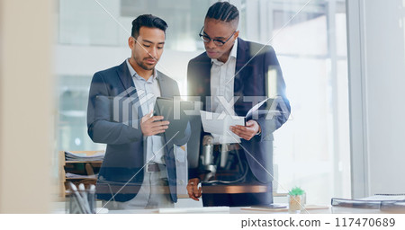 Man, teamwork and discussion with tablet in office, company review and online networking with employee. Conversation, documents and collaboration for target report, meeting and professionals together 117470689