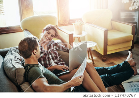 Happy couple, laptop and love on sofa for budget, planning and savings account for personal debt. Man, woman and together on couch with computer for expenses, tax and loan payment in living room 117470767