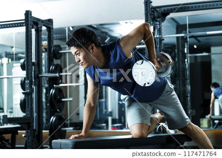 Men training in the gym Men training in the gym 117471764