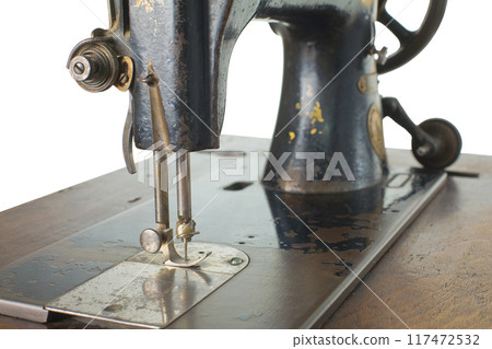 Antique Black Sewing Machine Isolated on White 117472532