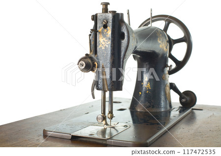 Antique Black Sewing Machine Isolated on White Antique Black Sewing Machine Isolated on White 117472535