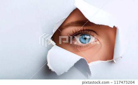 Beautiful Blue Eye of a Young Woman Looking Through Hole in White Torn Paper - Generative Ai 117473204