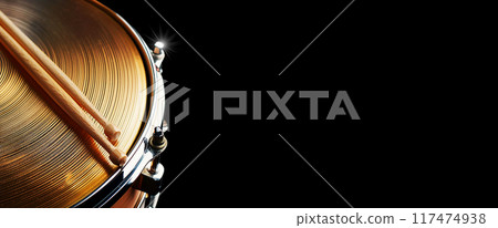 Two Wooden Drumsticks on a Snare Drum and Golden Cymbal - Generative Ai 117474938