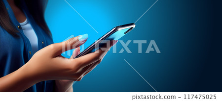 Woman Using a Smartphone on a Blue Background with Copy Space - Generative Ai 117475025