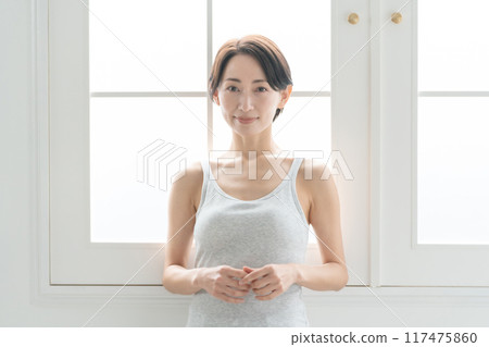 Middle-aged woman, beauty, sunshine Middle-aged woman, beauty, sunshine 117475860