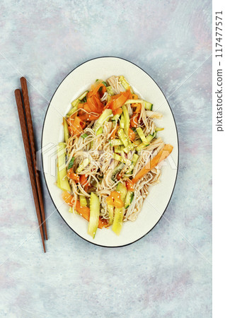 Enoki mushroom salad. 117477571